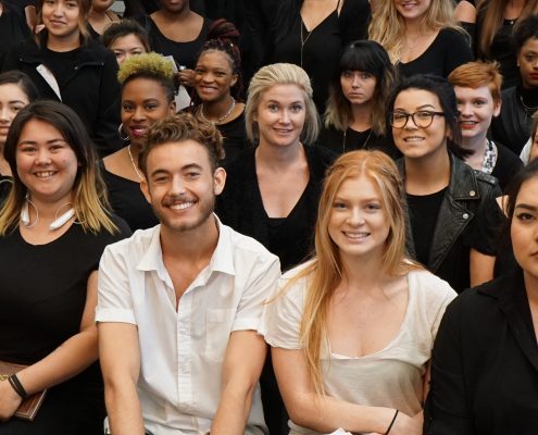 Carol Phillips at the Paul Mitchell School San Diego with Future Professionals